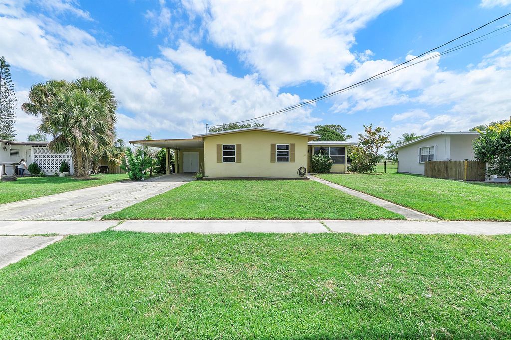 Photo of 2845 SE Morningside Boulevard, Port Saint Lucie, FL 34952 (MLS # R11078823)