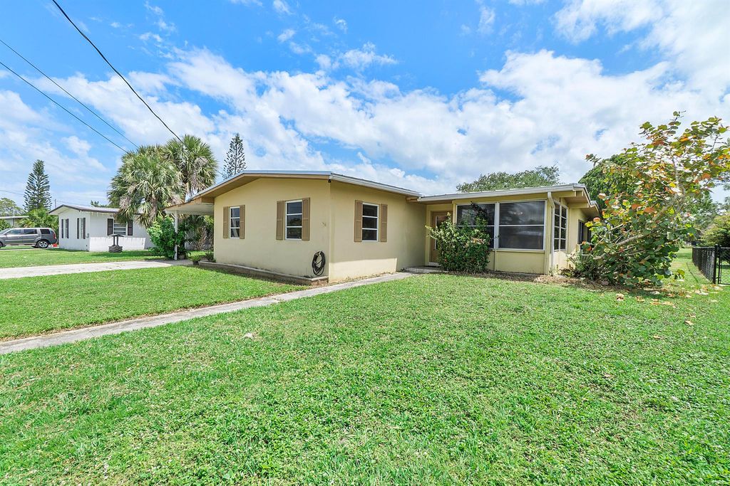 Photo of 2845 SE Morningside Boulevard, Port Saint Lucie, FL 34952 (MLS # R11078823)