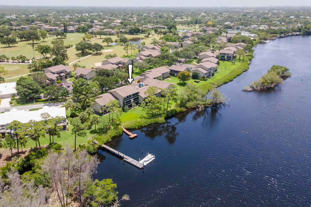 Photo of 9110 SE Riverfront Terrace Ter #G, Tequesta, FL 33469 (MLS # R10808542)