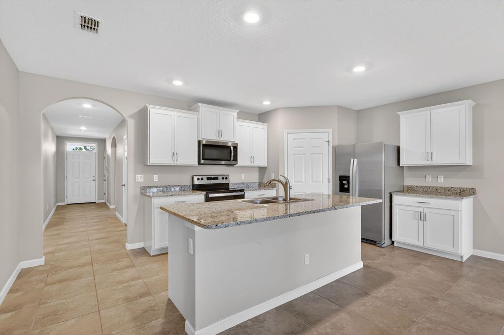 Photo of 6556 NW Oaklawn Way, Port Saint Lucie, FL 34983 (MLS # F10551720)