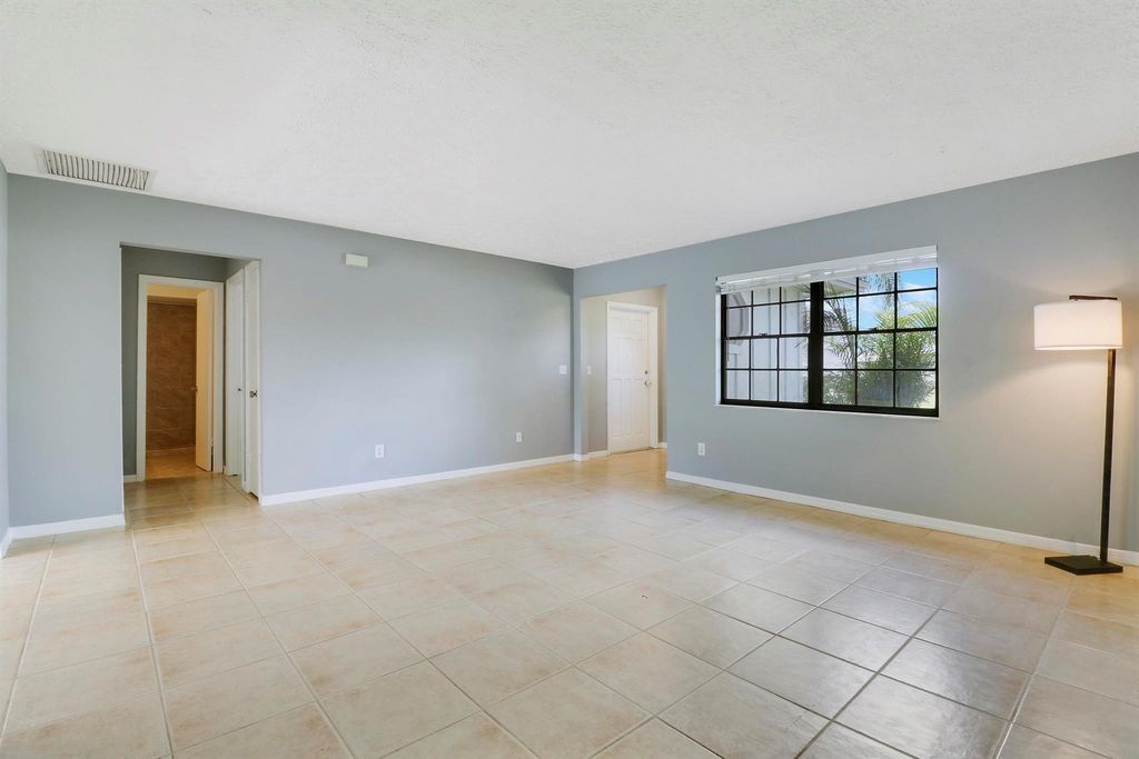 Photo of 1429 SE Ladner Street, Port Saint Lucie, FL 34983 (MLS # R10989863)