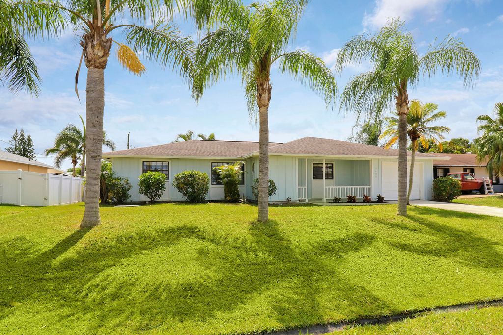 Photo of 1429 SE Ladner Street, Port Saint Lucie, FL 34983 (MLS # R10989863)
