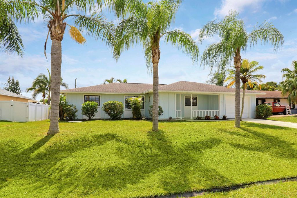 Photo of 1429 SE Ladner Street, Port Saint Lucie, FL 34983 (MLS # R10989863)