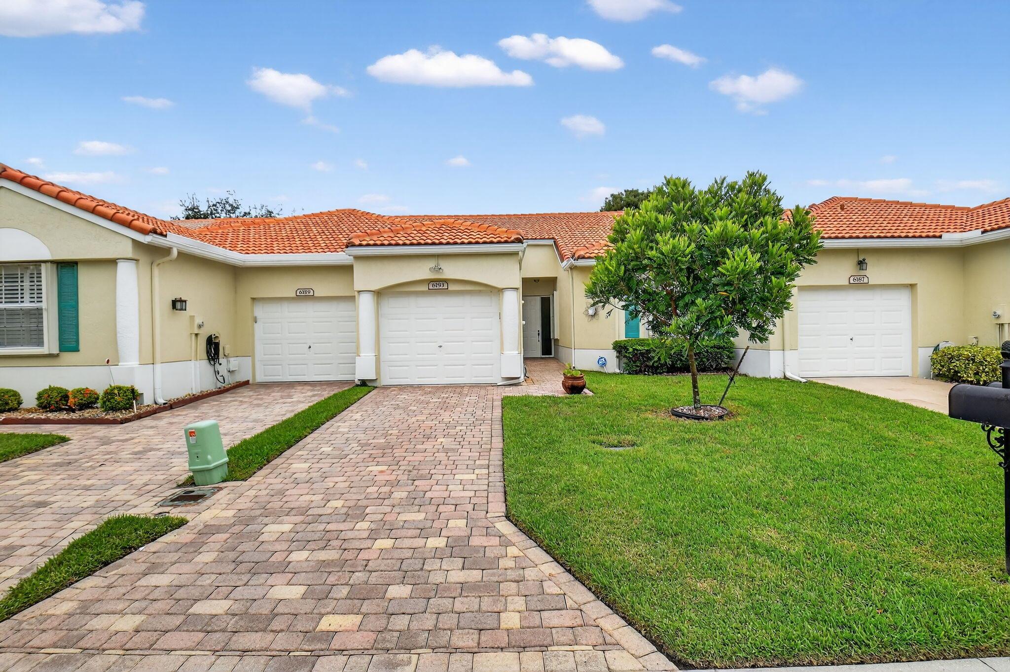 Must see this spacious 2 bedroom/2bath villa with a NEW ROOF (2023), NEW AC (2024), HOT WATER HEATER (2022). Bathrooms are upgraded with NEW CABINETRY&COUNTERTOPS (2025). All rooms FRESHLY PAINTED! This popular model features vaulted ceilings, oversize ceramic and wood-look tile flooring. Enjoy kitchen with stainless steel appliances and granite countertops. Enclosed screened patio and accordion shutters. The upgraded paver driveway and walkway enhance the beauty of this home. This active adult community features a renovated clubhouse with a ballroom, library/card room, gym, sauna, crafts, billiards, shows, clubs and more! Enjoy the 2 pools, tennis/pickle ball, bocce, putting green, shuffleboard. Social director and manager on site! LOW HOA FEE! with cable/internet. Furniture available.