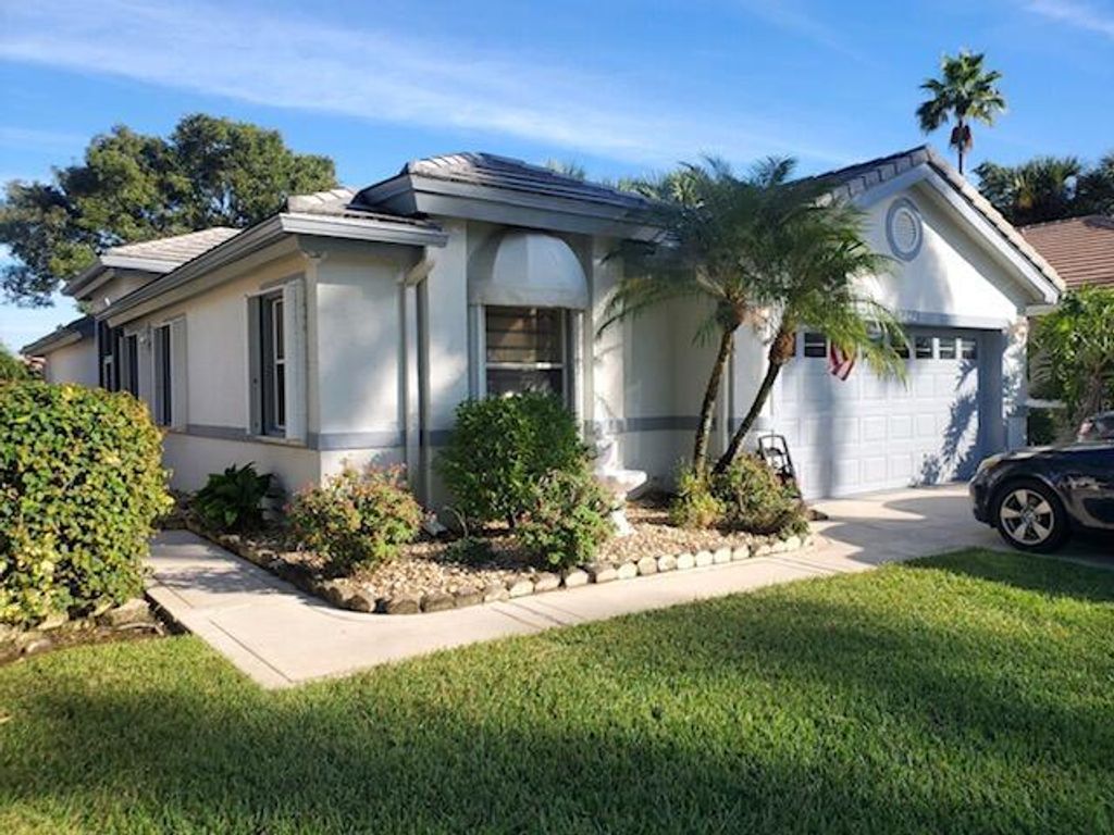 Photo of 6262 Breckenridge Circle Cir, Lake Worth Beach, FL 33467 (MLS # R10764458)
