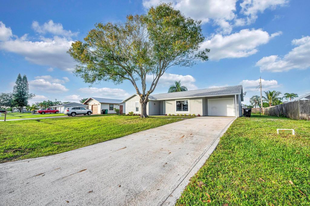 Photo of 643 SW Dolores Avenue, Port Saint Lucie, FL 34983 (MLS # R10944541)