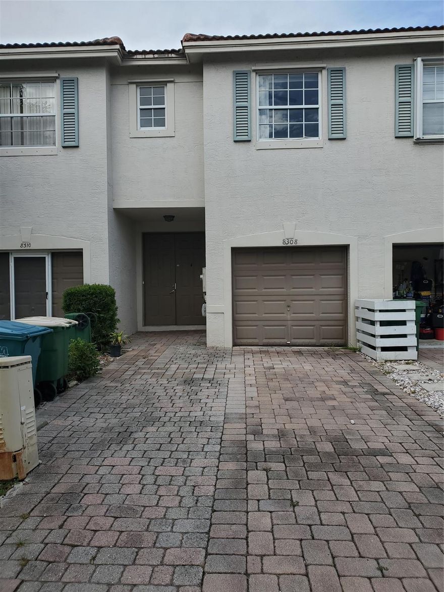 Come see this  community of Prestige Commons in Tamarac. This home features 3 bedrooms, 2.5 bathrooms and a one-car garage, along with a spacious open  kitchen. High ceilings and tile flooring . Upstairs,  wood floor laundry room. Outdoors, enjoy the open porch. Conveniently located near major highways, shopping and dining. Low association fee.
