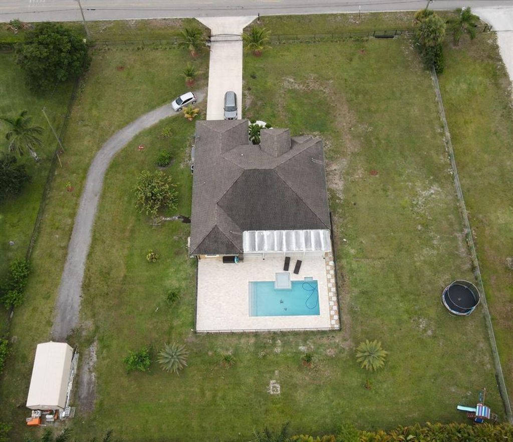 Photo of 15089 Tangerine Boulevard, Loxahatchee, FL 33470 (MLS # R10796657)