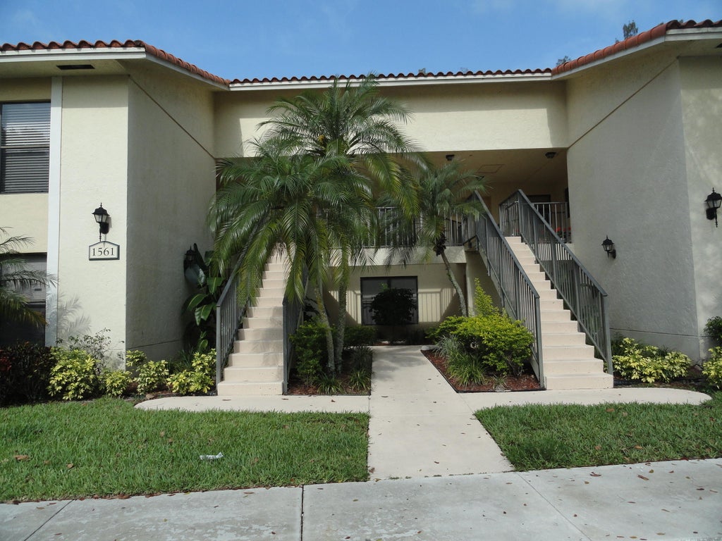 Photo of 1561 WINDORAH Way #C, West Palm Beach, FL 33411 (MLS # B26069841)