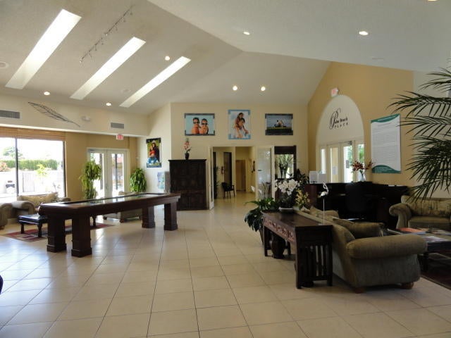 Photo of 1561 WINDORAH Way #C, West Palm Beach, FL 33411 (MLS # B26069841)