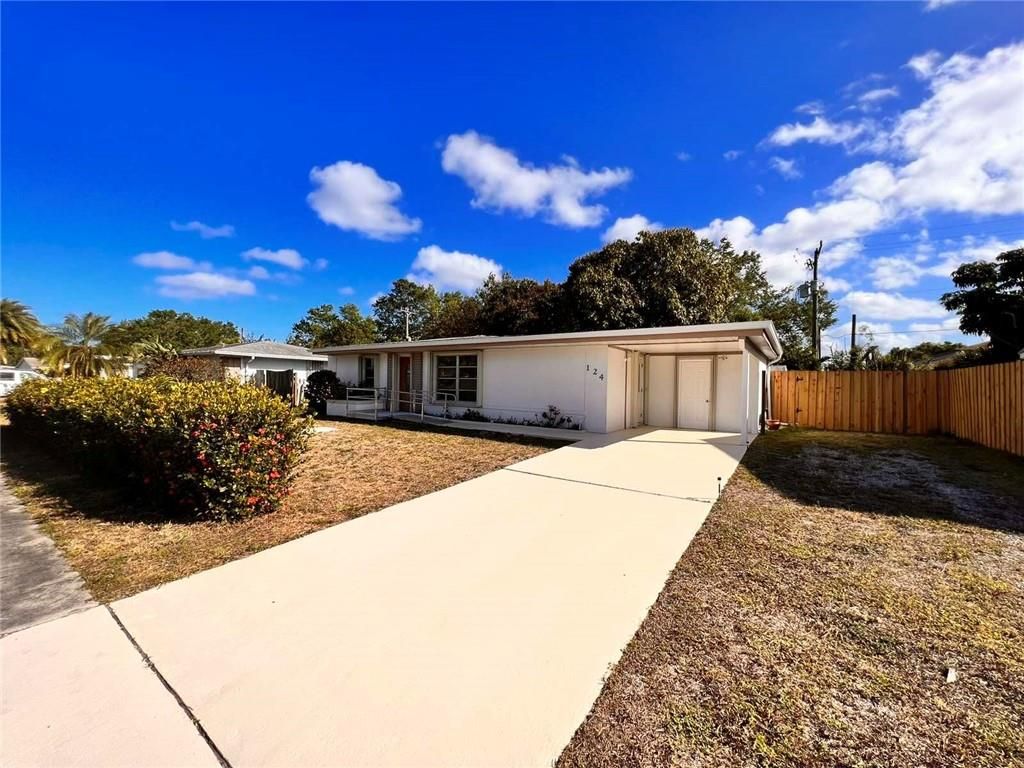 Photo of 124 NE Lobster Rd, Port St Lucie, FL 34983 (MLS # F10382622)