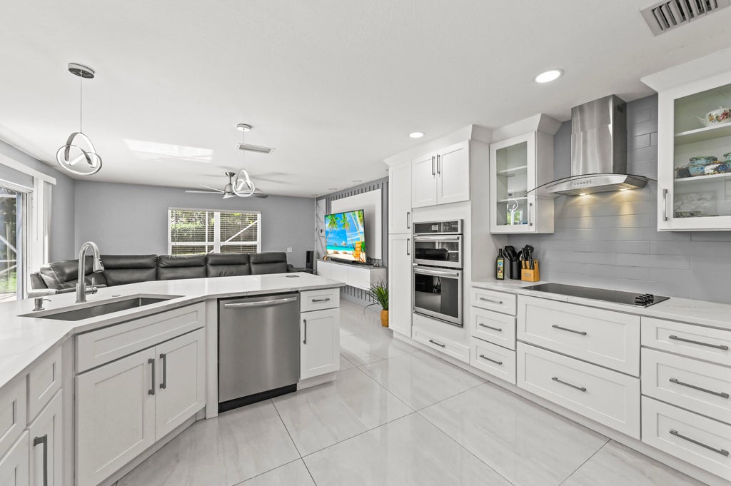 Photo of 5066 NORTHERN LIGHTS Drive, Greenacres, FL 33463 (MLS # B26057015)