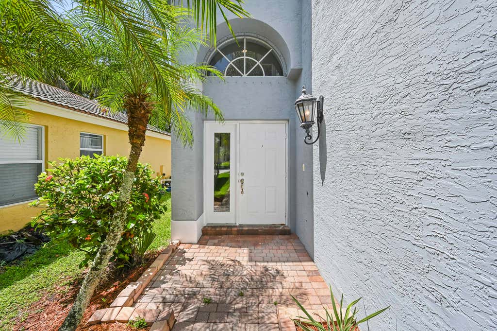 Photo of 5066 NORTHERN LIGHTS Drive, Greenacres, FL 33463 (MLS # B26057015)