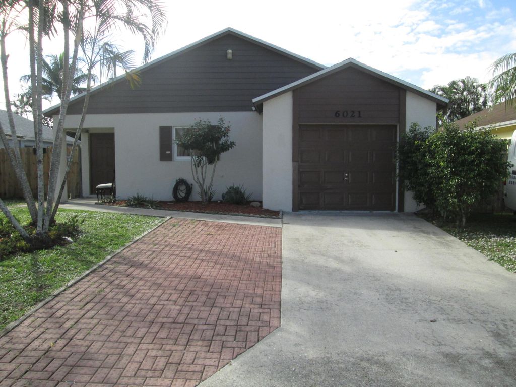 Photo of 6021 Lace Wood Circle, Lake Worth, FL 33462 (MLS # R10938481)
