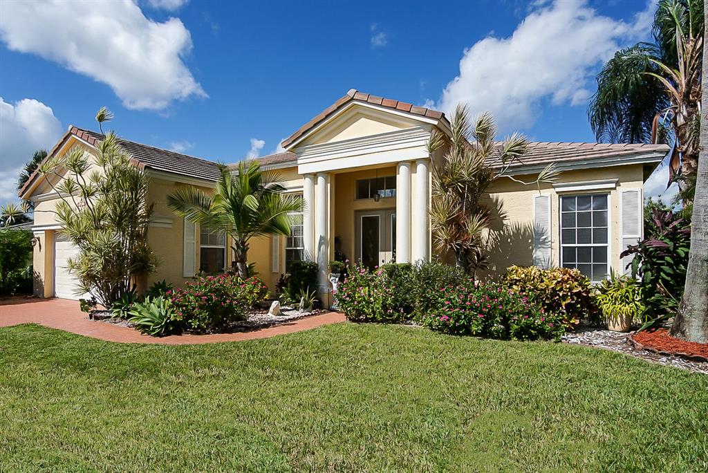 Welcome Home to this stunning Sparrow model in sought after Lake Forest in St Lucie West. This gorgeous move in ready home is perfectly designed for relaxing with long lake views, the second largest lot in the community, an oversized sun room to enjoy your morning coffee in, and entended patio perfect for entertaining in the evenings. As you enter this spacious home through the double glass doors, you are greeted by high volume ceilings with lots of natual light and beauiful lake views. The home features a formal dining room, formal living room with tray ceilings, white kitchen with breakfast nook that overlooks the cozy family room. The master suite has tray ceilings, double walk in closets and the master bathroom has a seperate soaker tub, shower and dual vanities.