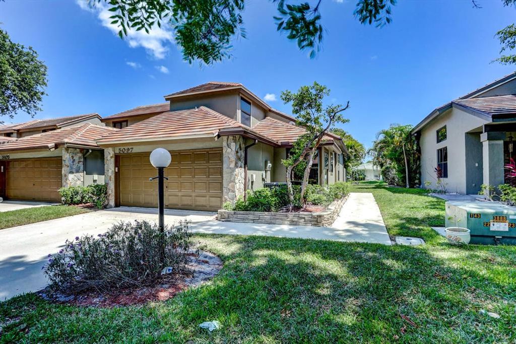 Photo of 5097 Thyme Drive, Palm Beach Gardens, FL 33418 (MLS # R10718790)