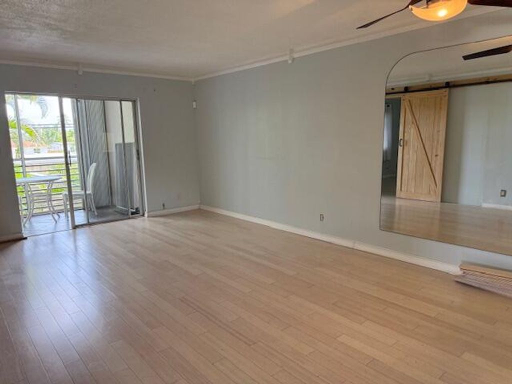 Photo of 2811 S Garden Drive #201, Palm Springs, FL 33461 (MLS # R11122009)
