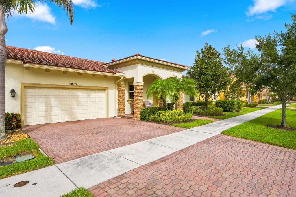 Photo of 10263 SW Reggiani Road, Port Saint Lucie, FL 34986 (MLS # B26051394)