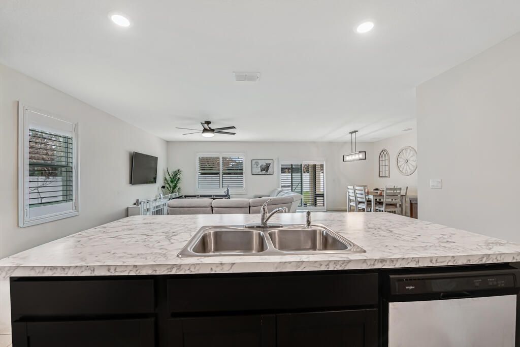 Photo of 1066 SW Coleman Avenue, Port Saint Lucie, FL 34953 (MLS # R11169550)