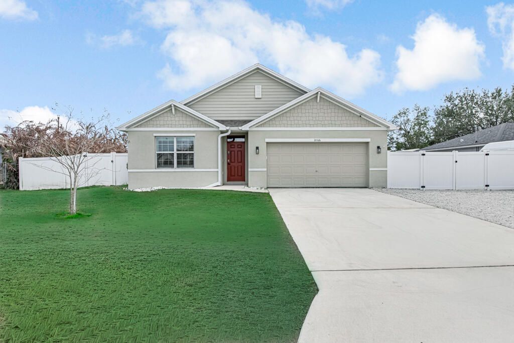 Photo of 1066 SW Coleman Avenue, Port Saint Lucie, FL 34953 (MLS # R11169550)