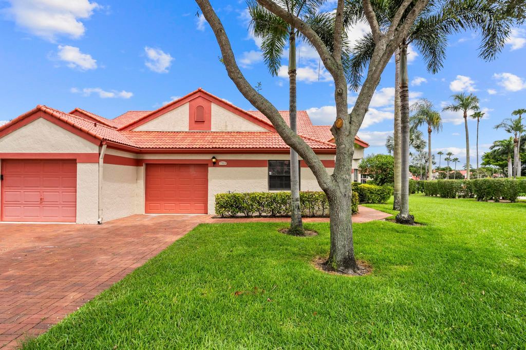 Photo of 7792 Lexington Club Boulevard #B, Delray Beach, FL 33446 (MLS # B26049698)