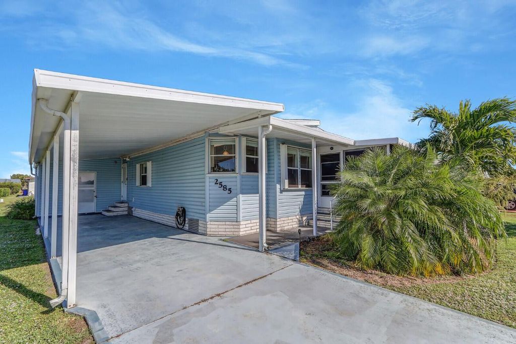 Photo of 2585 SW Marquis Terrace, Stuart, FL 34997 (MLS # R10940259)