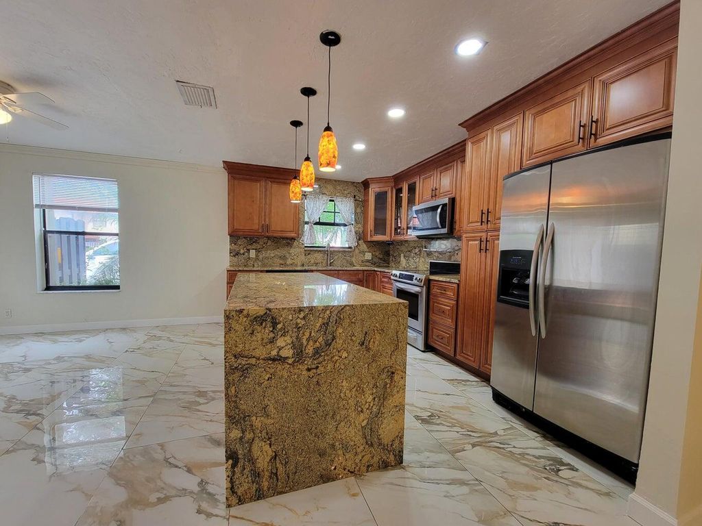 Photo of 1436 SW 25th A Avenue #A, Boynton Beach, FL 33426 (MLS # R11104376)