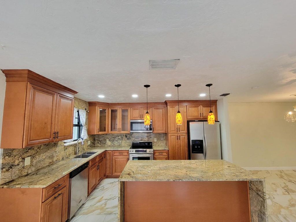 Photo of 1436 SW 25th A Avenue #A, Boynton Beach, FL 33426 (MLS # R11104376)