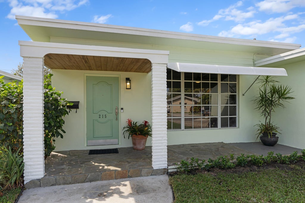 Photo of 215 Columbia Drive, Lake Worth Beach, FL 33460 (MLS # B26079021)