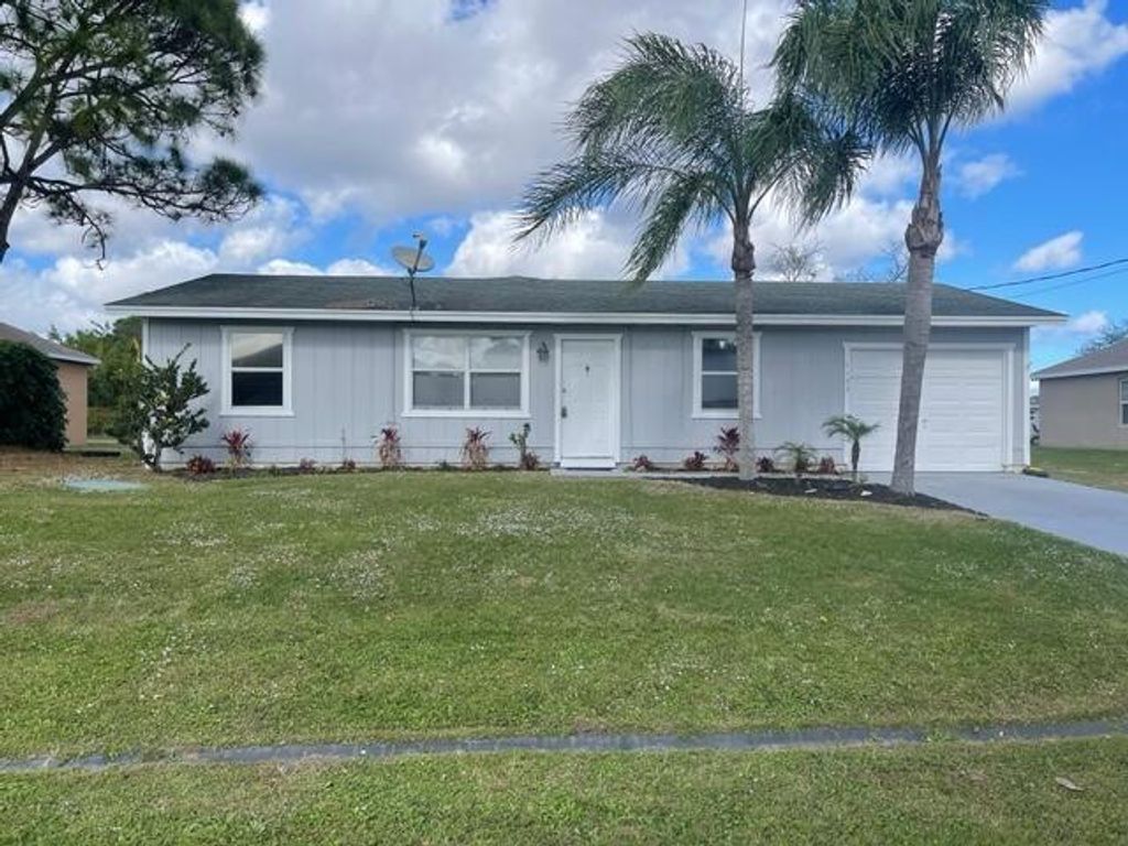 Photo of 1133 SW Sarto Lane, Port Saint Lucie, FL 34953 (MLS # R10769101)