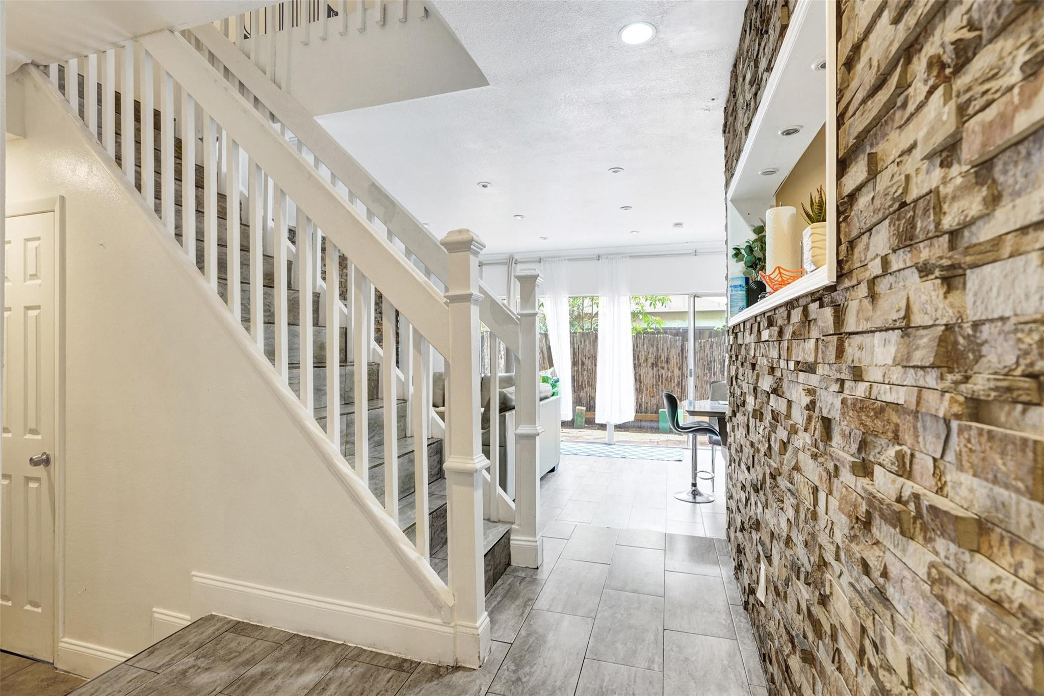 TOWNHOUSES AT JACARANDA - Residential