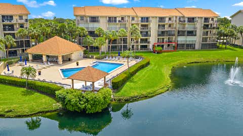 Photo of 701 Seafarer Circle #103, Jupiter, FL 33477 (MLS # B26059191)