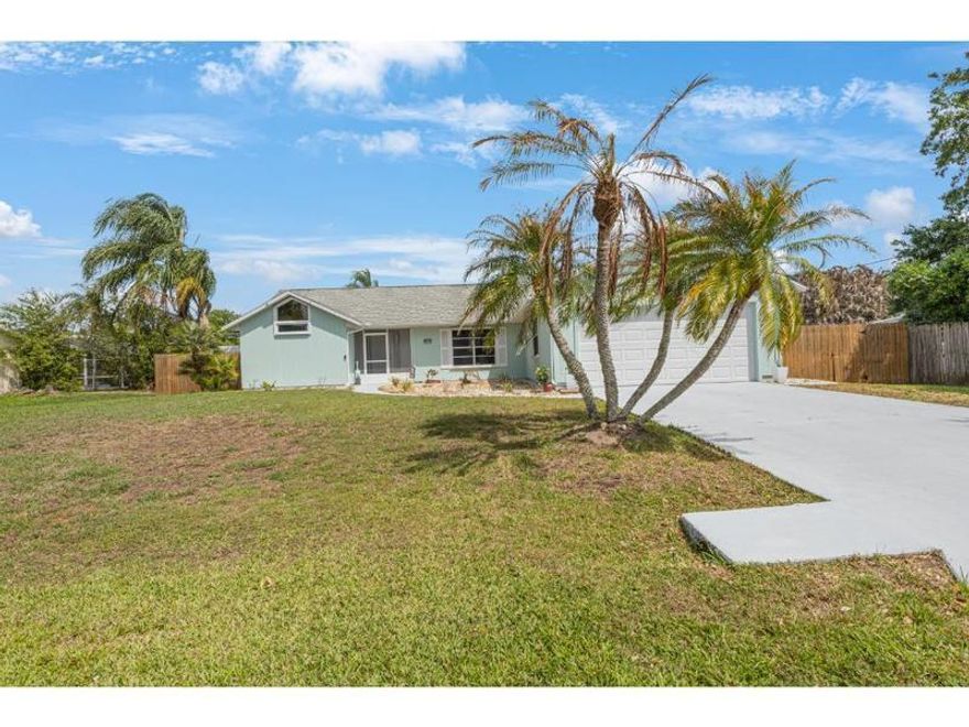 Welcome to 814 Floraland Avenue located in desirable Sebastian Highlands w/ no HOA! This beautifully remodeled home features an updated kitchen with attractive matte finish granite counters, new Stainless-Steel appliances, & custom lighting. The private backyard showcases a screened in pool, new privacy fence, & small storage shed. Additional features include a new AC (2023), new garage door (2019), split floor plan, vaulted ceilings & hurricane shutter protection. Roof is from 2003 - priced accordingly. Rmszappr@sub2err