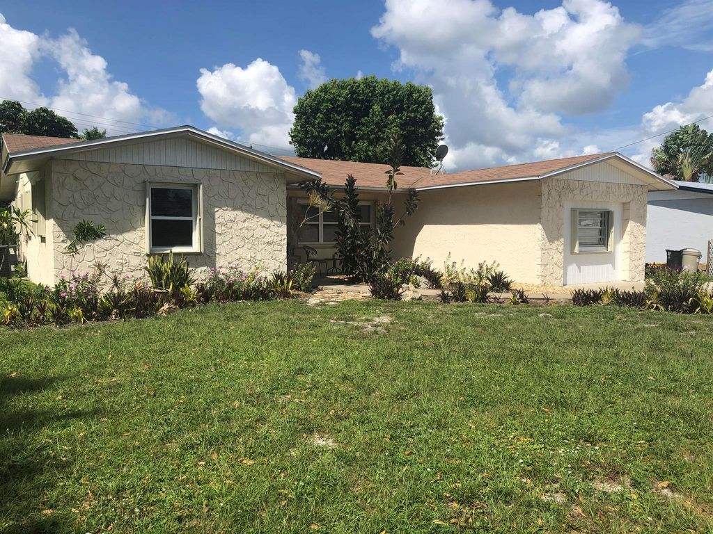 Photo of 1514 NE 24th Street, Jensen Beach, FL 34957 (MLS # R11012773)