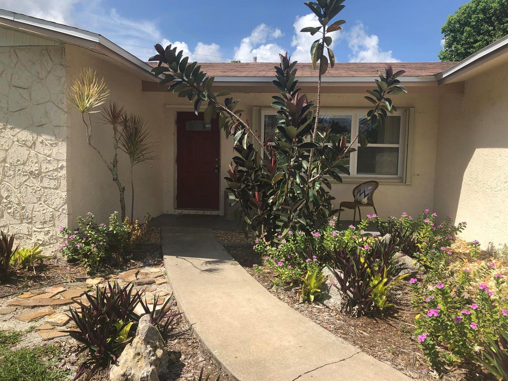 Photo of 1514 NE 24th Street, Jensen Beach, FL 34957 (MLS # R11012773)