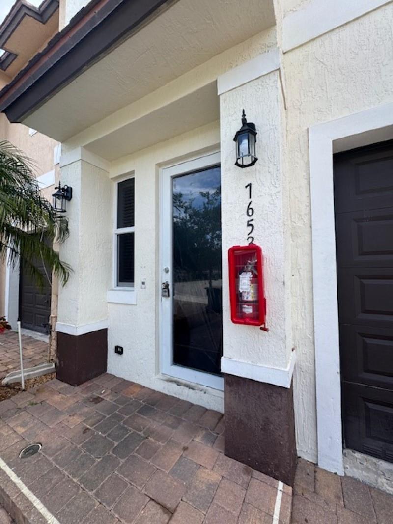Newer build 3 bed -2.5 bath with garage 2 story! Full impact windows, modern Stylish Tamarac townhome with garage. 3BR, 2.5BA, spacious layout, stainless steel kitchen, central AC, washer/dryer, ceramic floors downstairs, laminated wood upstairs. Private balcony room. Close to shopping, dining, Sawgrass Expressway, parks. Professional maintenance.