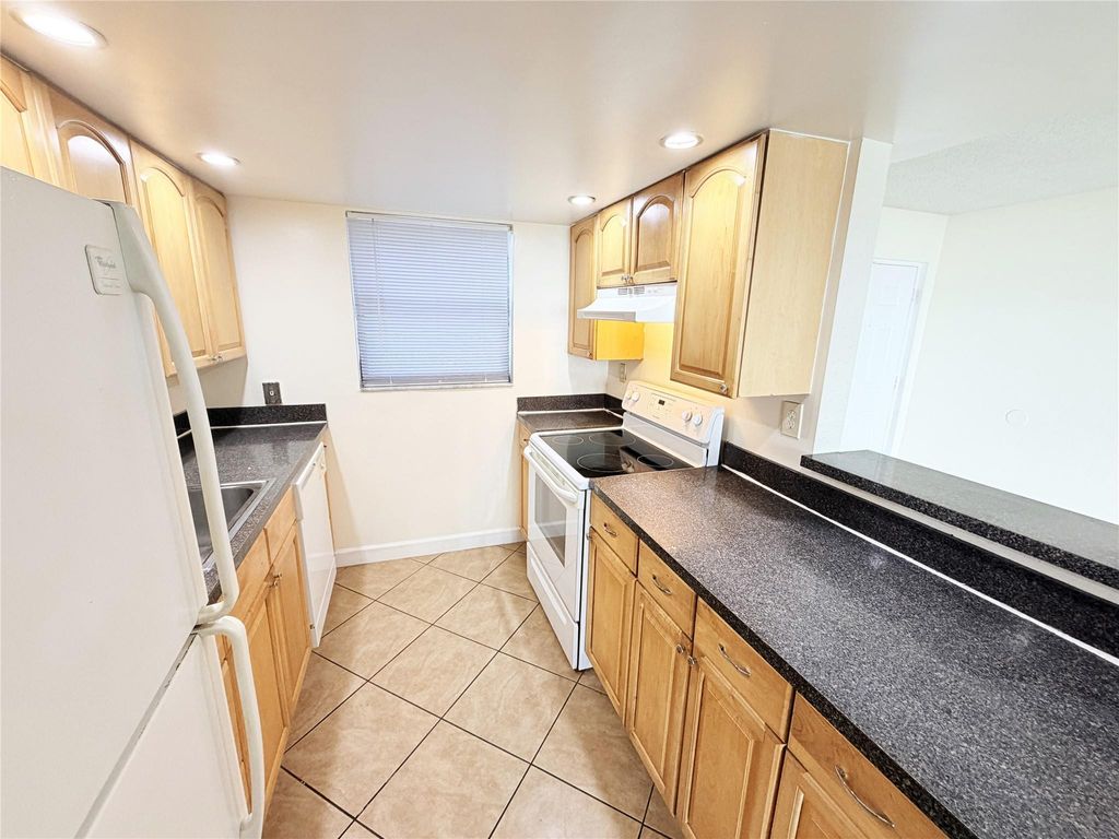 Photo of 1950 N Congress Avenue #103, West Palm Beach, FL 33401 (MLS # F10551613)