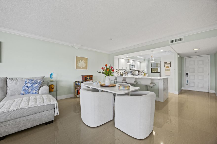 Updated 2-bedroom, 2-bathroom condo perched on the second floor. This home offers views to one of the world class golf courses.  Wake up to breathtaking sunrises from your screened-in balcony and enjoy peaceful sunsets from your kitchen window. The open floor plan is perfect for entertaining, highlighted by a fully renovated kitchen. The spacious primary suite features a walk-in closet, updated bath, and tranquil views of the golf course and green space. The second bedroom acts as another ensuite. The condo also features ample storage and a walk in laundry room.  Enjoy close proximity to beaches, dining, shopping, and entertainment. Briarwood community has their own pool. Membership does not convey with condo.