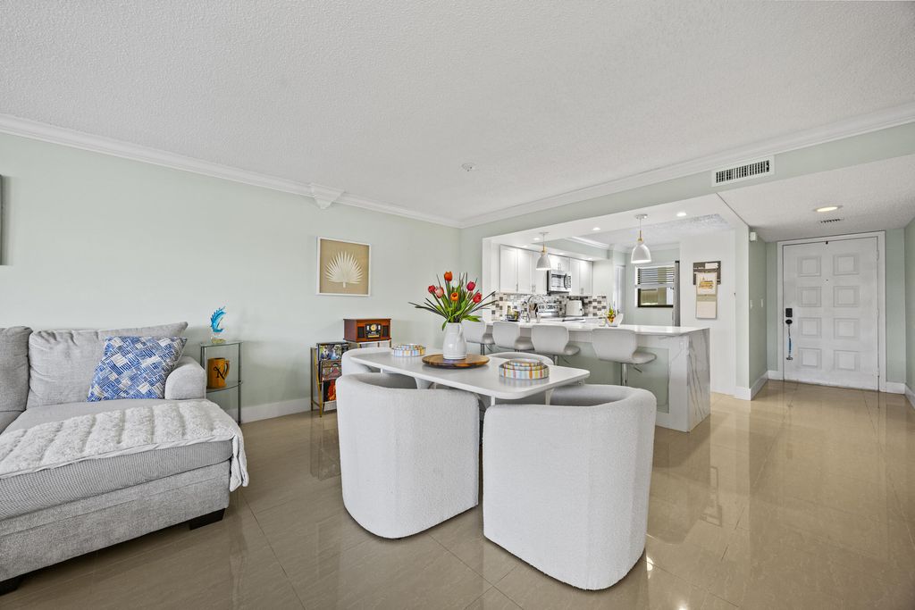 Photo of 12926 Briarlake Drive #201, Palm Beach Gardens, FL 33418 (MLS # R11160180)