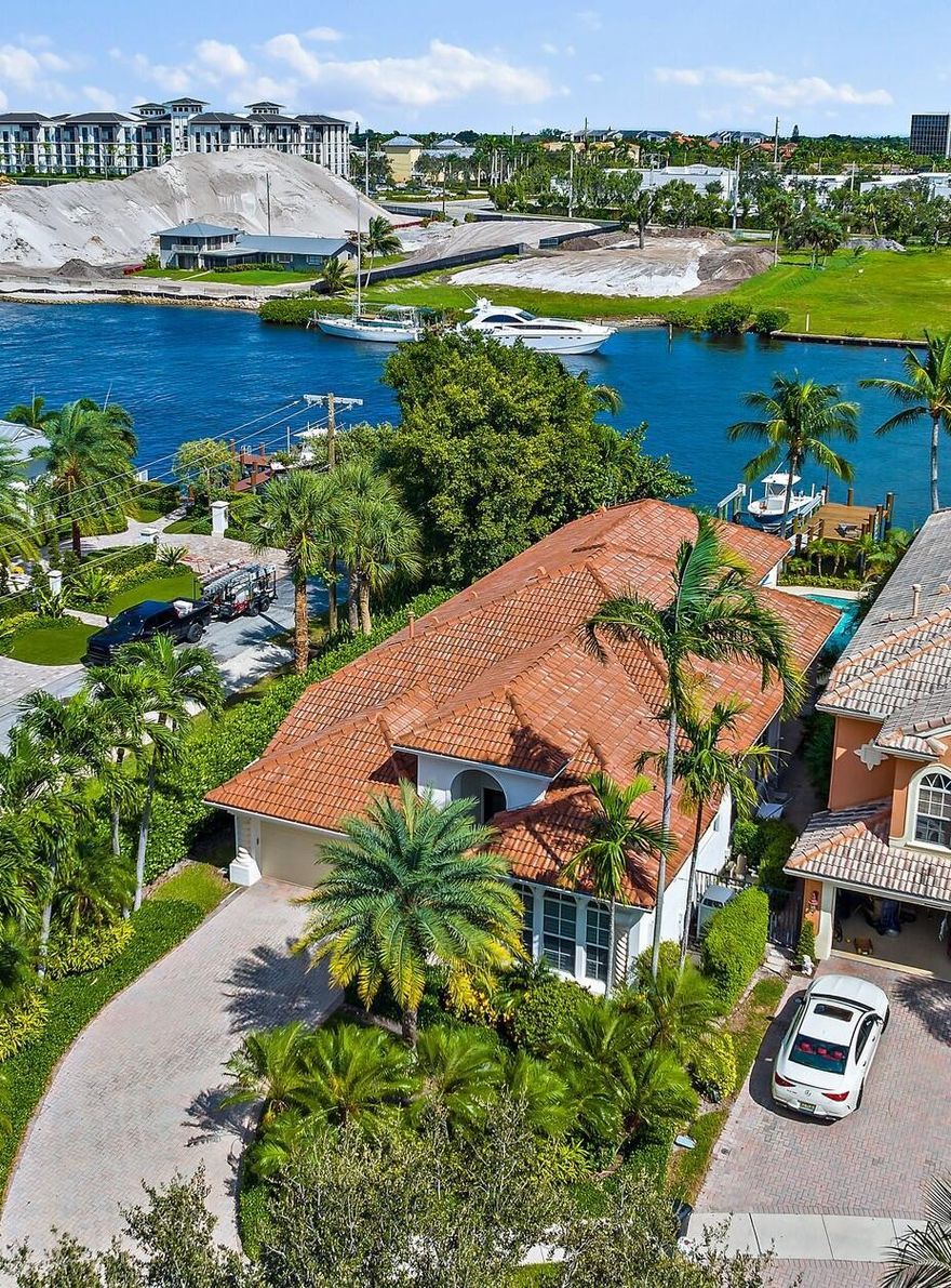 Fabulously decorated PROSPERITY HARBOR Catalina Ranch home Directly on the Intracoastal with its own dock and 20,000 # Boat lift. Enjoy the views of the ICW from your large pool that overlooks the waterway. All the amenities that one would expect, Granite Counter tops, Stainless Appliances, Crown Moldings, Plantation Style Shutters and Doors, Impact Windows, Gas Fireplace. The Third Bedroom of this home has been converted into a professional office with extensive built in cabinetry. The house can be sold both furnished and unfurnished. This house is being sold in ''AS-IS'' condition.