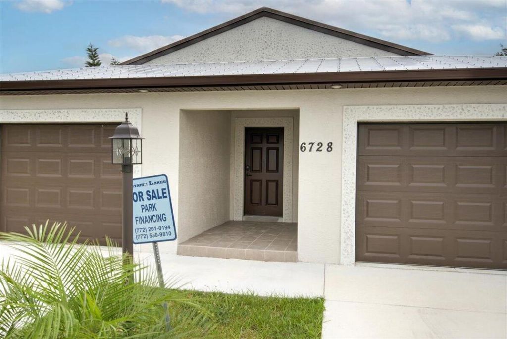 Photo of 6728 Spanish Lake Boulevard, Fort Pierce, FL 34951 (MLS # R11090484)