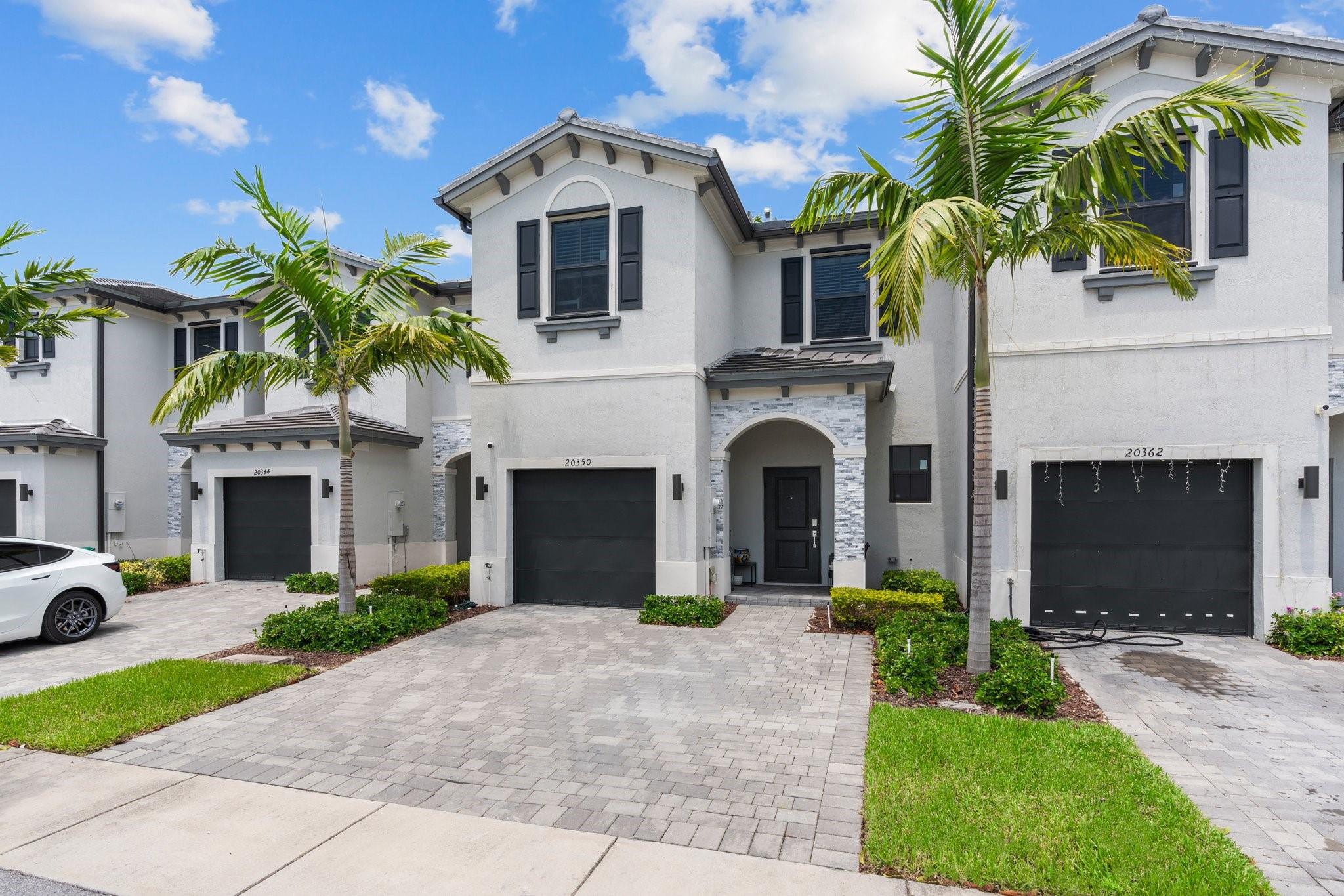 Welcome to this stunning, modern 3 bedroom, 2.5 townhouse with 1 car garage located within a gated community! This property was built in 2023 and features kitchen granite counter tops, stainless steel appliances, and sleek cabinets. This home features an open floor concept with a built in Smart Home System. Additional upgrades include a concrete back patio and laminate flooring throughout the second floor. This community features amazing amenities including a clubhouse, pool, fitness center and children's playground. Washer and dryer do not convey. This home is priced to sell quickly. Please schedule your private showing today!