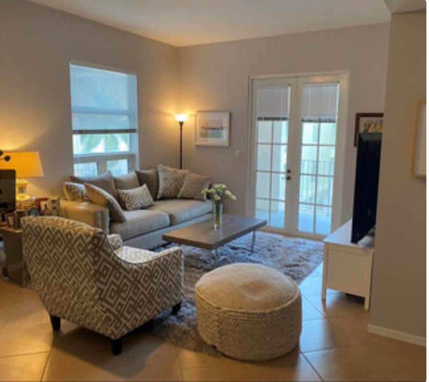 This is the best of all worlds, A tropical paradise awaits you when you live in Abacoa. You enjoy a downtown urban lifestyle and are close to the bluest waters of Jupiter beach, tropical dining, boating, paddle boarding while the restaurants, coffee shops, shopping and Roger Dean Stadium are right in your backyard. Immaculate light and bright corner unit with beautiful balcony overlooking town center. Open floor plan with high ceilings. Nice kitchen opens to common area, Unit is in great condition with spacious rooms and Large bedroom. Enjoy community pool, fitness center, side walks, green space and local events in town center. PETS WELCOME! Are YOU ready for your home away from home?