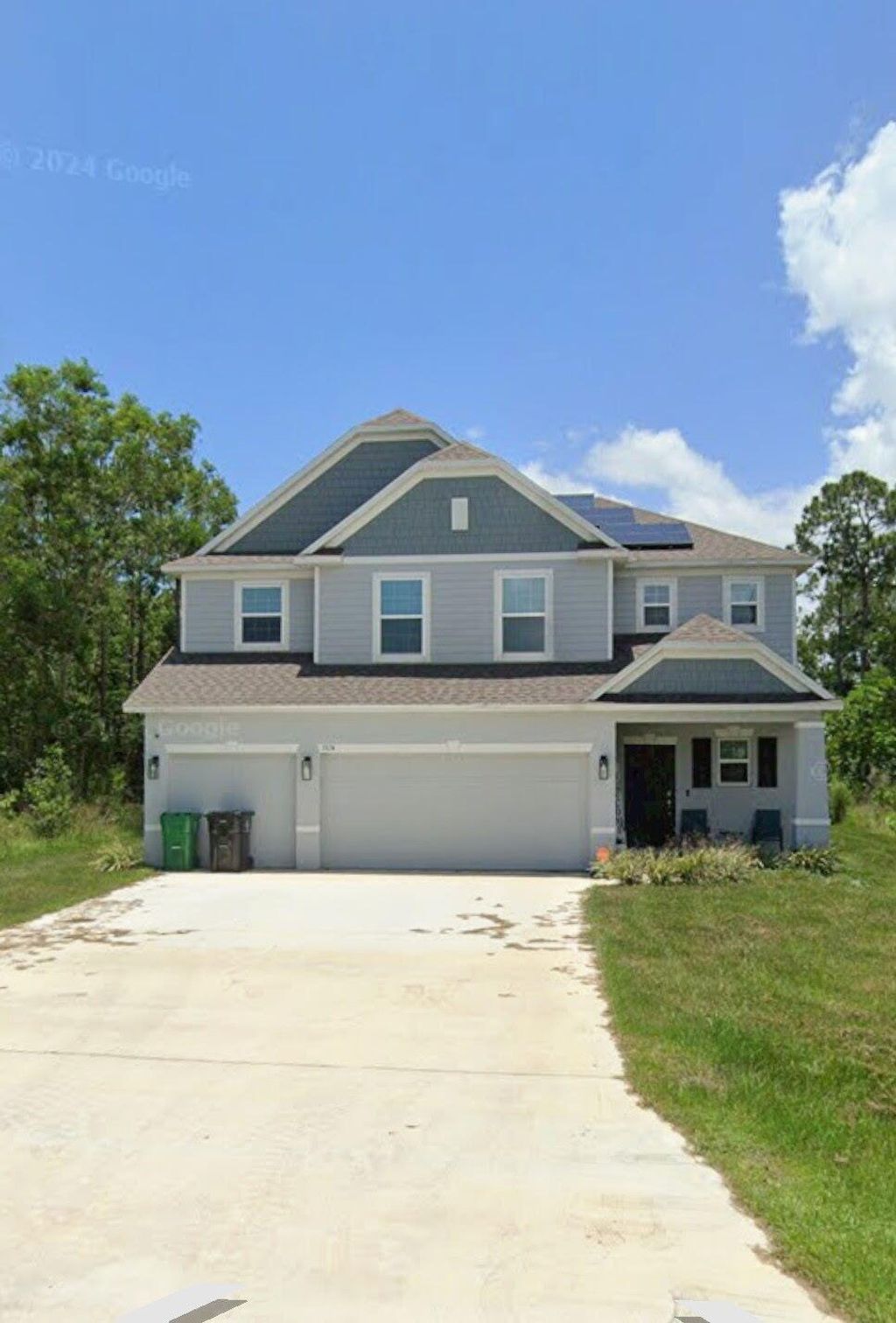 Photo of 5874 NW Hann Drive, Port Saint Lucie, FL 34986 (MLS # B26038448)