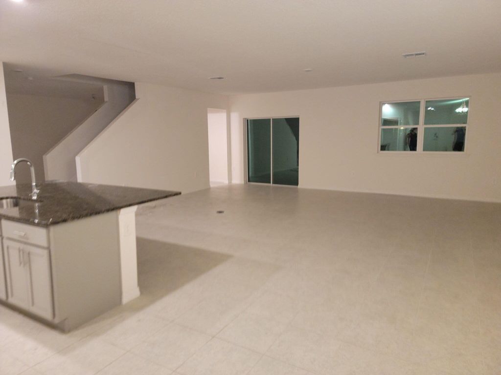 Photo of 5874 NW Hann Drive, Port Saint Lucie, FL 34986 (MLS # B26038448)