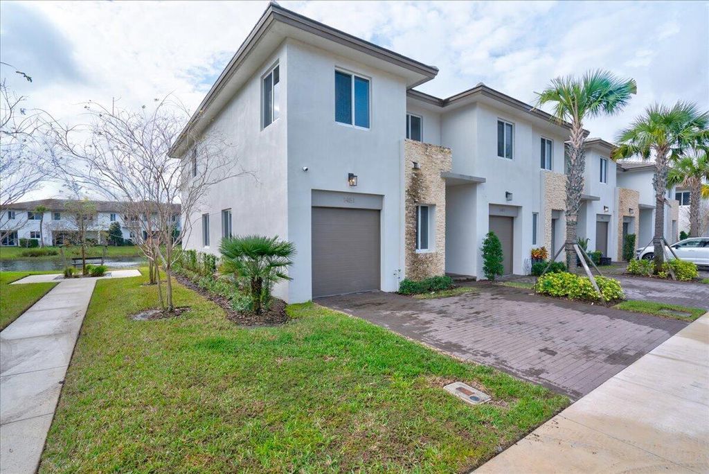 Photo of 1451 Pioneer Way, Royal Palm Beach, FL 33411 (MLS # B26025375)