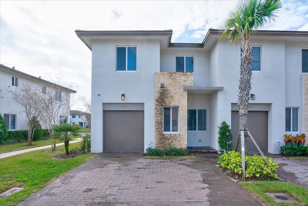 Photo of 1451 Pioneer Way, Royal Palm Beach, FL 33411 (MLS # B26025375)