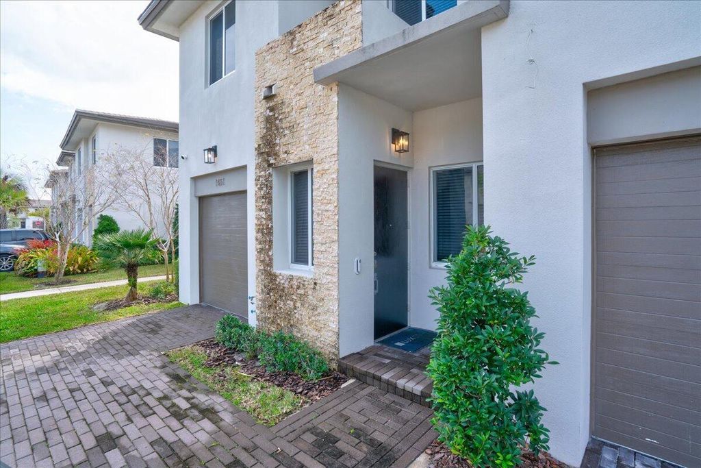 Photo of 1451 Pioneer Way, Royal Palm Beach, FL 33411 (MLS # B26025375)