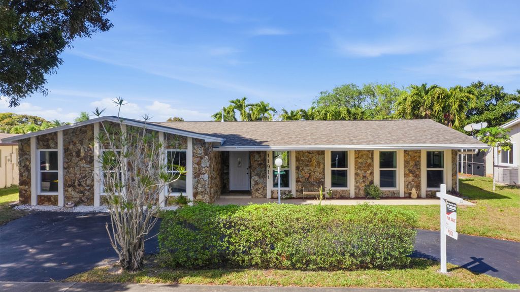 Photo of 11911 NW 14th Court, Pembroke Pines, FL 33026 (MLS # R11165291)