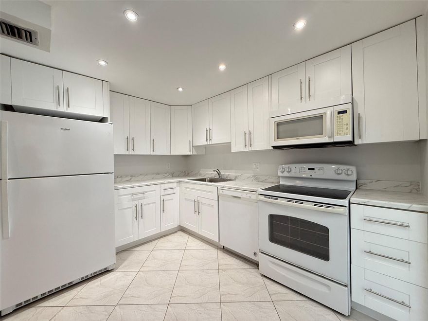 Beautifully updated 2-bedroom, 2-bath condo in desirable Palm Aire Country Club. Enjoy serene lake views from your private balcony in this spacious, light-filled unit. The kitchen is updated with modern finishes, & countertops, and stainless —perfect for entertaining. Both bedrooms offer en suite bathrooms, generous closet space, and the open layout provides seamless indoor-outdoor living. Plenty of parking available for residents and guests. Conveniently located near Harrahs Casino, Top Golf, shopping, dining, and major highways. Community amenities include pools, walking paths, and more. Association requires 700 credit score. Rent includes internet & basic cable.